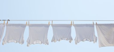 White underpants hanging to dry clipart