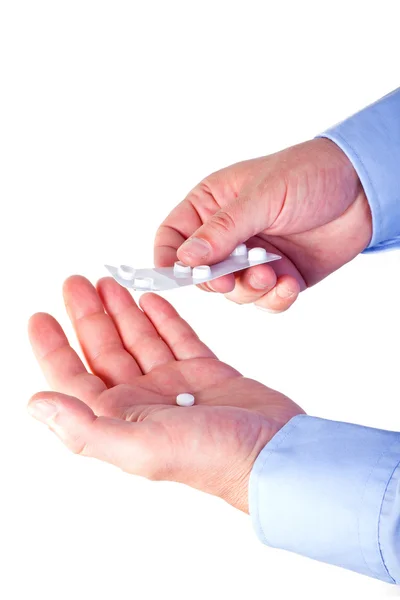 Mão dando pílulas — Fotografia de Stock
