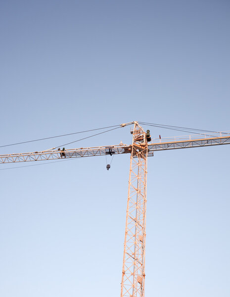 Crane on the blue sky