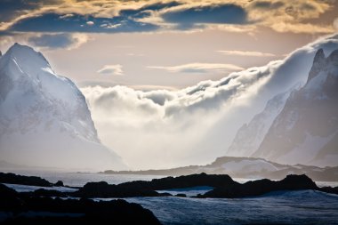 Snow-capped mountains in Antarctica clipart