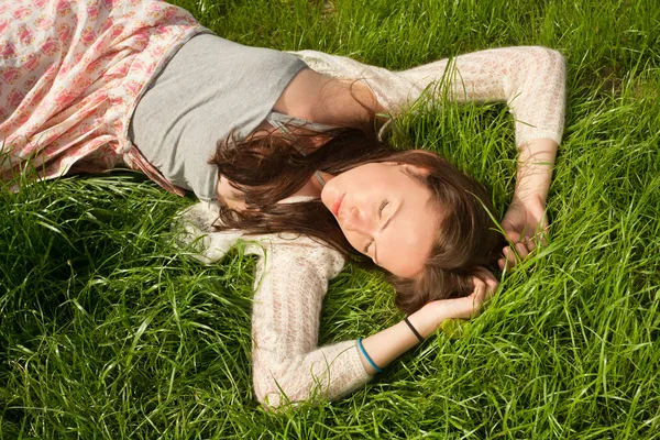 Beautiful girl on grass — Stock Photo, Image