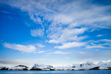 Beautiful snow-capped mountains clipart