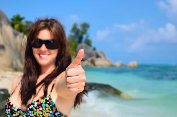 Girl doing the thumbs up sign — Stock Photo, Image