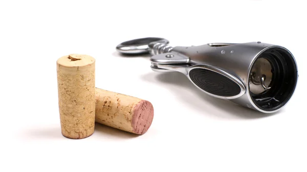 Corkscrew and corks — Stock Photo, Image