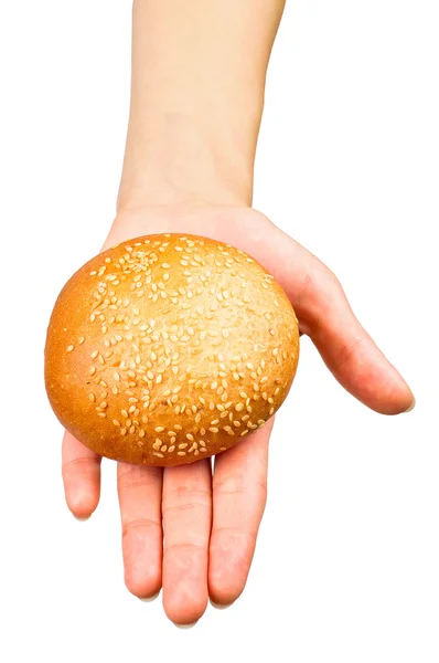 Mão dando um pão — Fotografia de Stock
