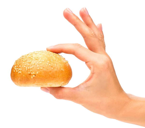 Hand met broodje — Stockfoto