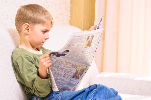 stock image Boy with newspaper