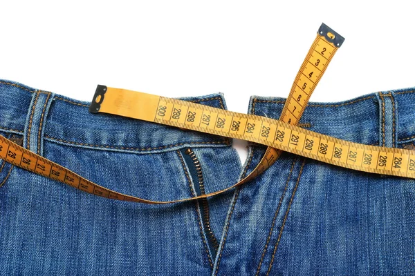 Kot pantolon ve şerit metre — Stok fotoğraf