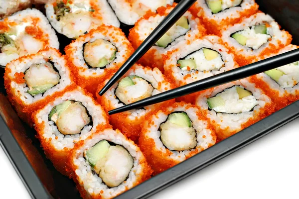 Grand ensemble de sushis colorés et baguettes — Photo