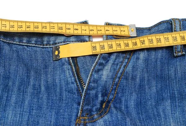 Jeans and tape measure — Stock Photo, Image