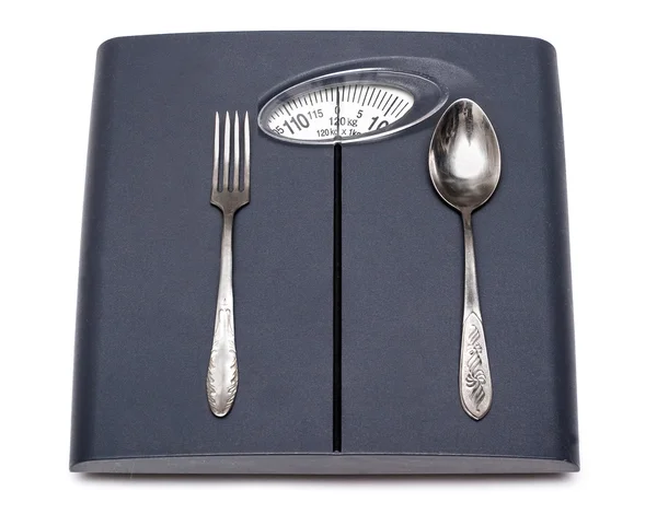 stock image Bathroom scales, fork and spoon