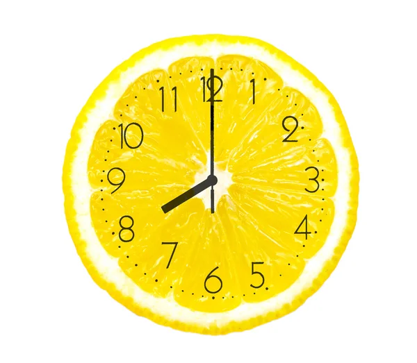 Fatia de limão como o relógio — Fotografia de Stock