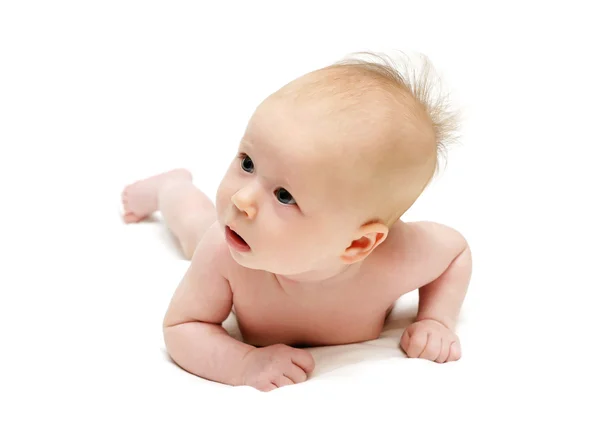 Rastejando bebê olhando para a esquerda — Fotografia de Stock