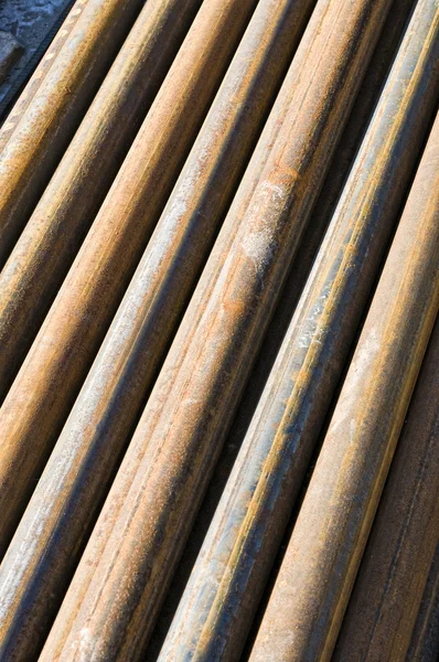 stock image Stack of rusty old pipes