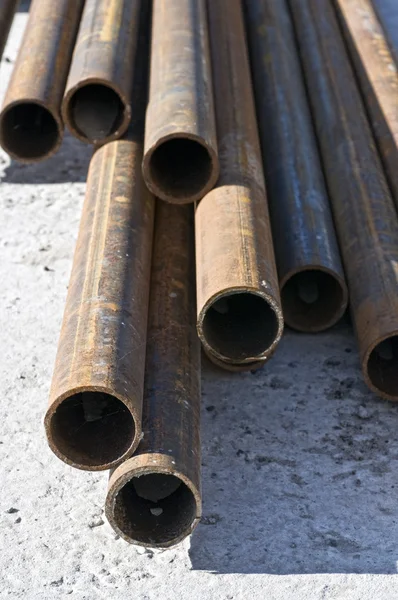 Stock image Stack of rusty old pipes