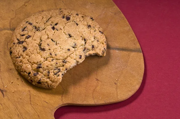 Csokoládé cookie-k több mint egy vágódeszka Stock Kép