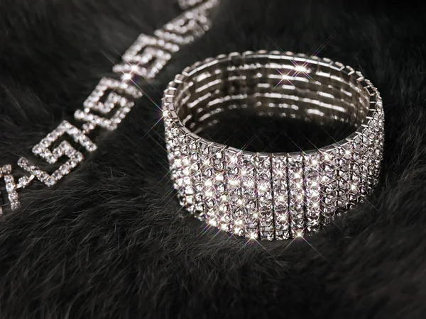 Brilliant jewellery at fur — Stock Photo, Image