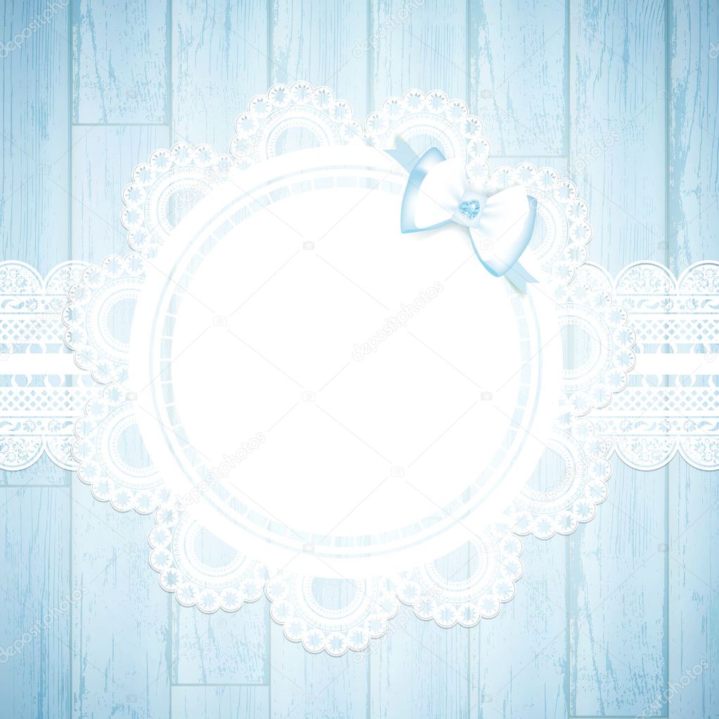 Lace round frame at wooden background