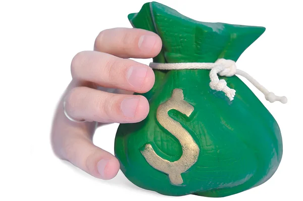 Hand reaching for a money bag — Stock Photo, Image