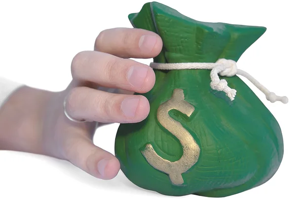 Hand reaching for a money bag — Stock Photo, Image