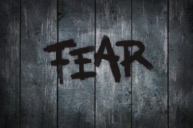 Fear on wooden planks clipart