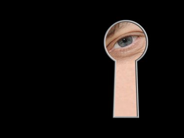 Look through a keyhole in black background clipart