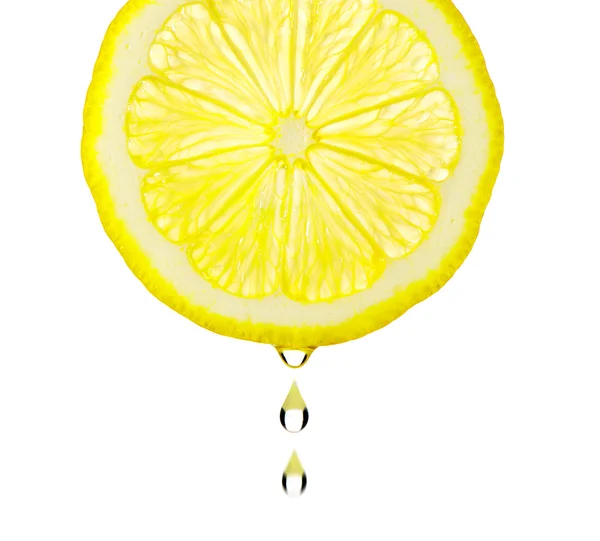 Sectie met druppel citroen — Stockfoto