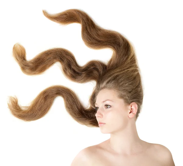 風によって作成されたモーションの健康な美しい長い髪のクローズ アップ — ストック写真