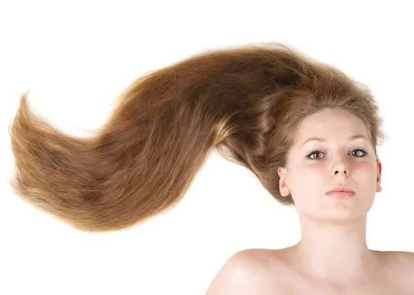 Gezonde mooie lange haren close-up in beweging gemaakt door wind — Stockfoto