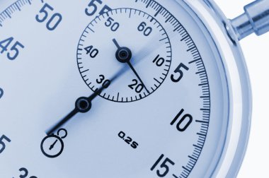 Stopwatch closeup. With a moving arrow clipart