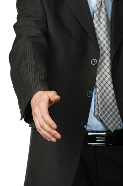 Geschäftsmann streckt Hand aus — Stockfoto