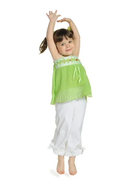 La niña feliz salta hacia arriba — Foto de Stock