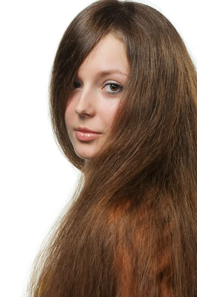 La hermosa chica con el pelo largo y saludable —  Fotos de Stock