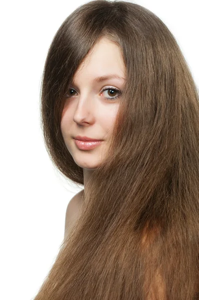 La hermosa chica con el pelo largo y saludable —  Fotos de Stock