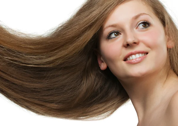 Υγιή και όμορφα μακριά μαλλιά closeup σε κίνηση που δημιουργήθηκε από τον άνεμο — Φωτογραφία Αρχείου