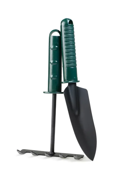 The garden tool a shovel, a rake. — Stock Photo, Image