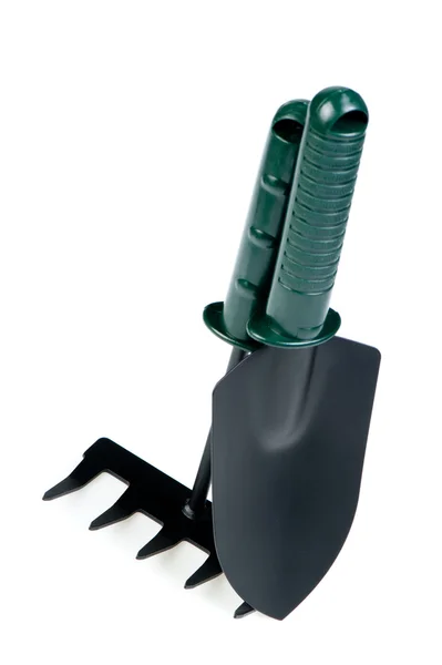 The garden tool a shovel, a rake. — Stock Photo, Image