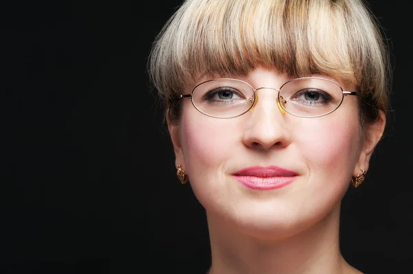 Portrait of the woman in eyeglasses close up — Stock Photo, Image
