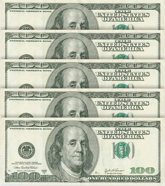 Банкноты по 100 долларов — стоковое фото