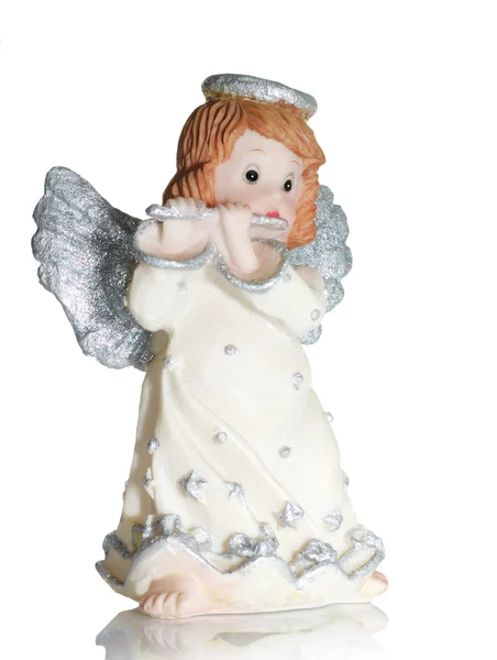 Angel playing on a flute Stock Picture