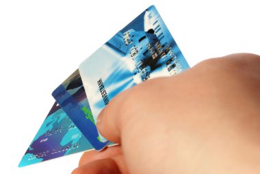 Credit cards in a hand of the man clipart