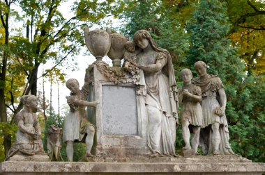 Tombstone family on a cemetery clipart