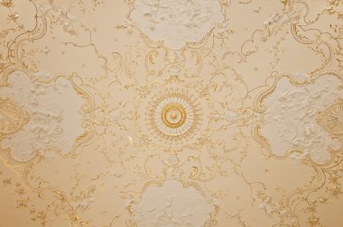 Ceiling with a gold ornament clipart