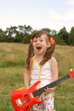 The girl with a guitar clipart