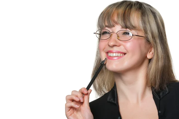 La mujer de negocios en gafas graduadas y con pluma — Foto de Stock