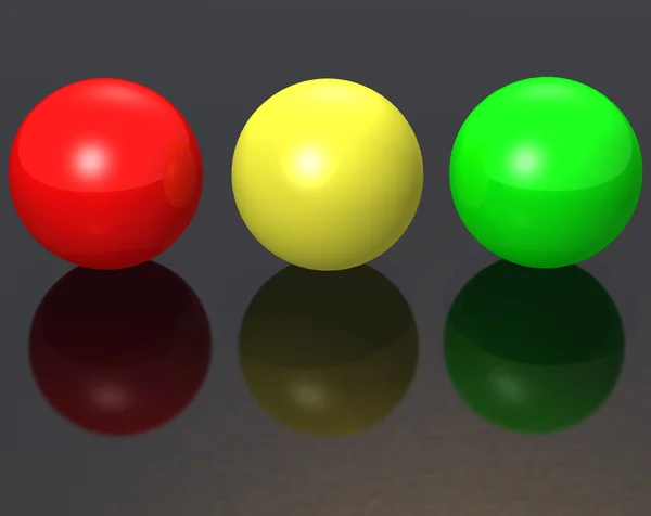 Három fém piros gömbök - szín -, greeen, sárga — Stock Fotó