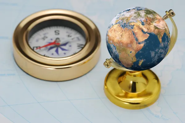 Kompas a země — Stock fotografie
