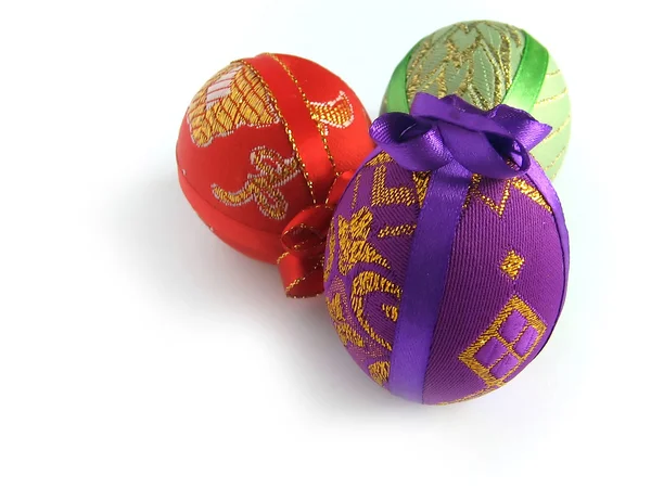 Easter painted egg tied up by tapes — Stock Photo, Image