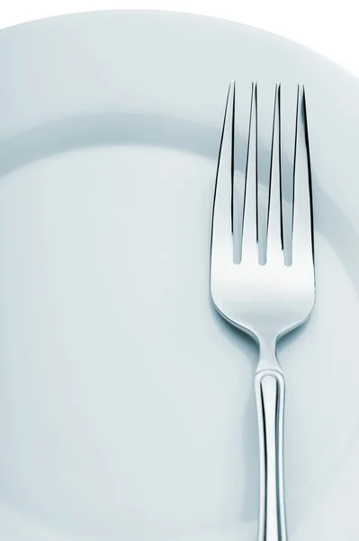 Fork on a plate — Stock Photo, Image