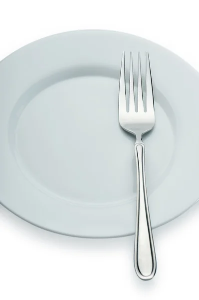 Fourchette sur une assiette — Photo